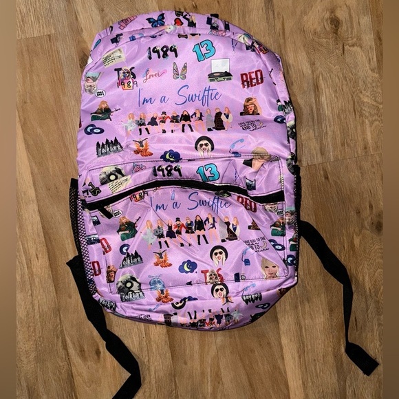 TAYLOR SWIFT ERAS SCHOOL BACKPACK
SWIFTIE MERCH 1989 LOVER RED SHOWGIRL - Picture 1 of 5